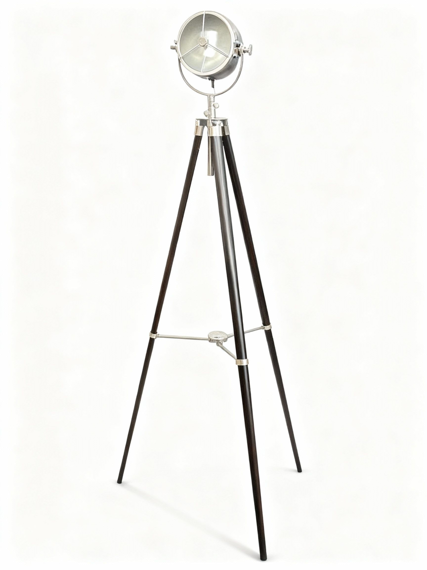 Projector floor lamp with slender black lacquered wooden tripod base and brilliant chrome/silver metal spotlight head, inspired by cinema studios