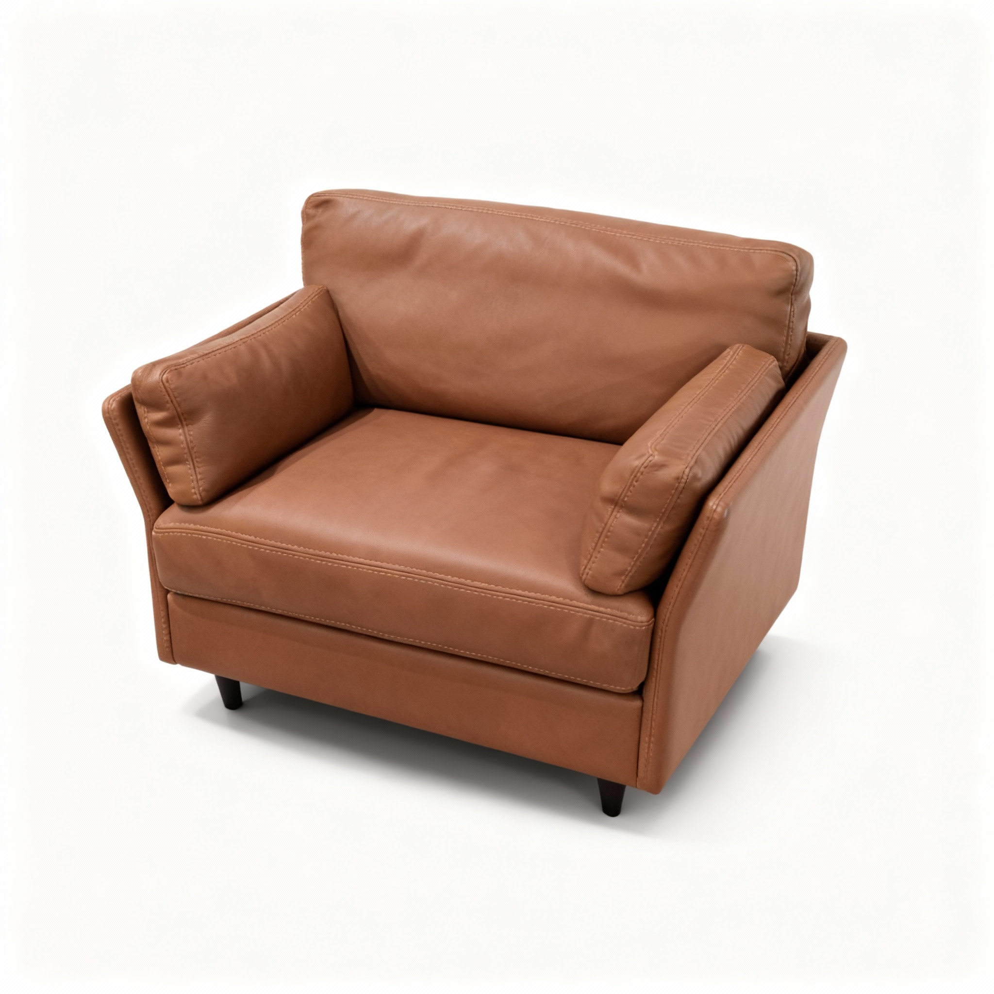Classic club armchair with generous, enveloping cushions, upholstered in rich chestnut-brown genuine leather with a natural, developing patina.Accessibility (screen readers) and Image SEO.