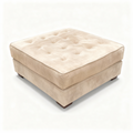 Square champagne tufted ottoman in soft velvet-style fabric
