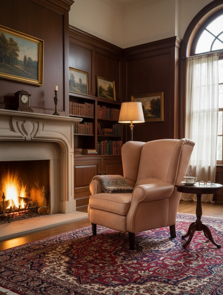 "Clint" luxury wing chair (85x90x102cm) upholstered in full-grain leather, featuring a robust wooden frame and a blend of Bultex and feather filling for ultimate comfort