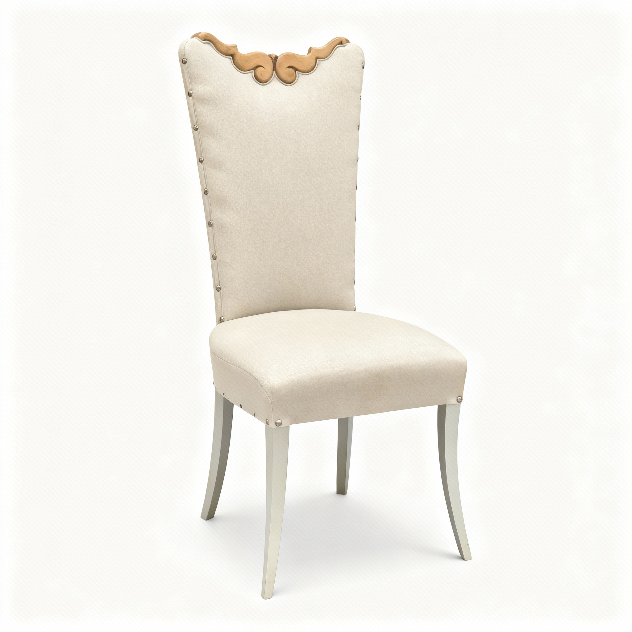 Elegant dining chairs with high, enveloping backrests, upholstered in beige/off-white fabric, featuring carved woodwork at the top and gray patinated saber-back legs.Accessibility (screen readers) and Image SEO.