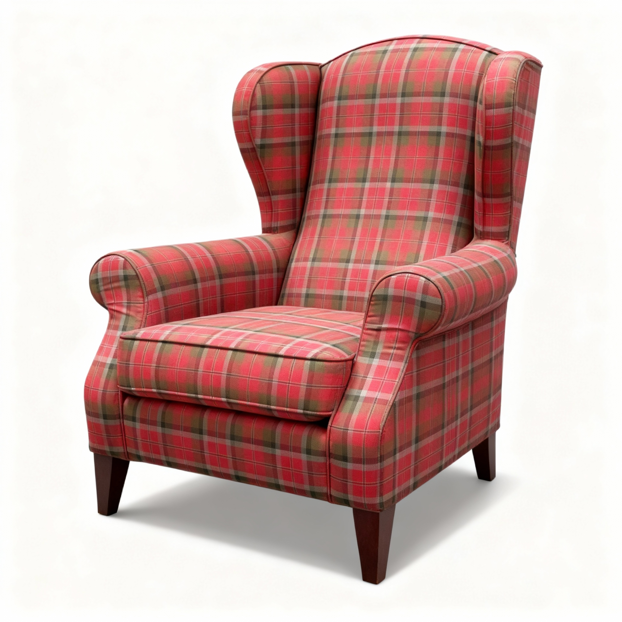 "HIGHLAND" bergère armchair with classic wingback shape, upholstered in vibrant tartan fabric featuring fuchsia pink and khaki/olive green shades