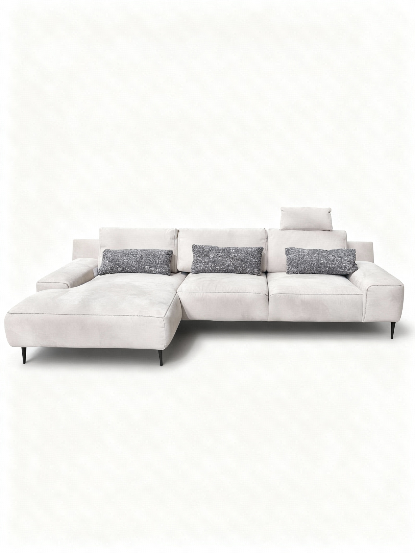 LOLA contemporary sectional sofa (324x162cm) in light grey fabric with left-arm chaise lounge and contrasting anthracite lumbar cushions