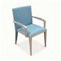 Lagon Bleu accent chair in blue-green fabric with walnut frame