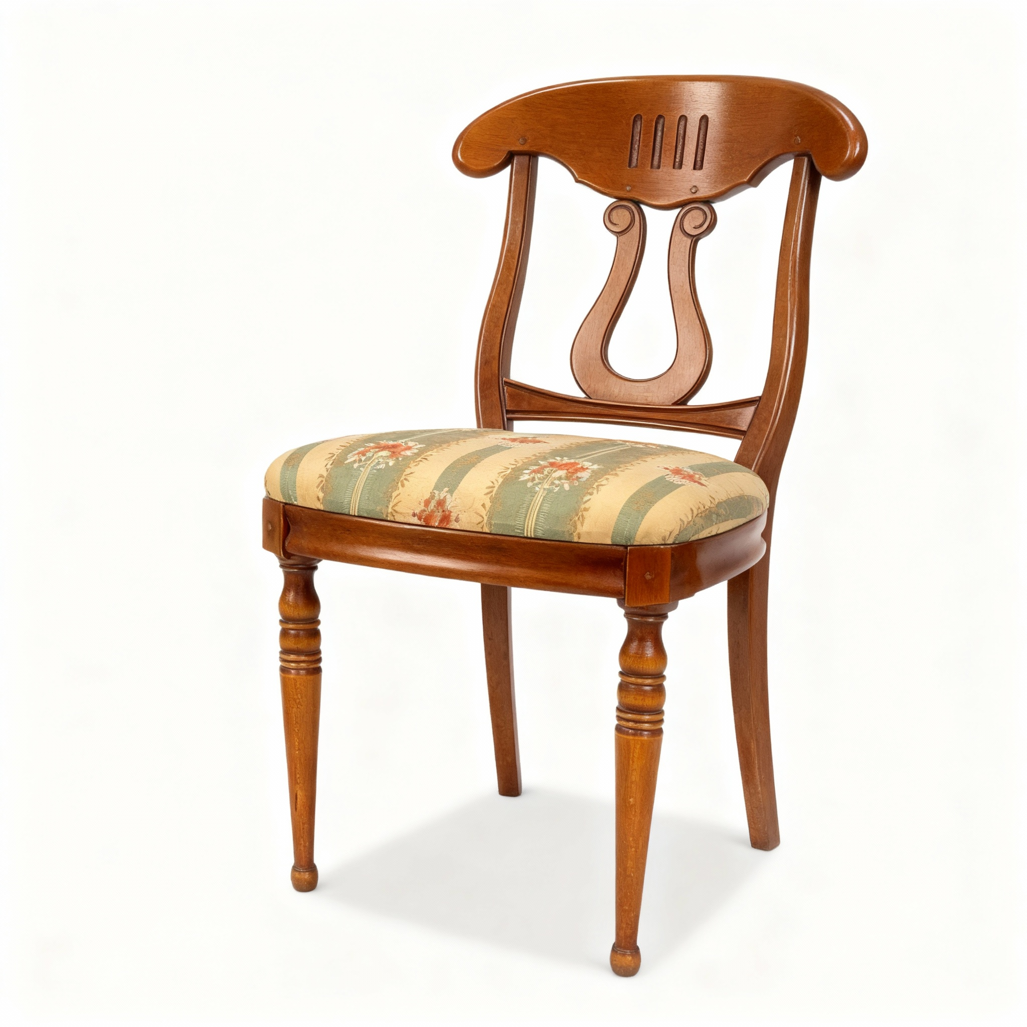 Classic "Lyre Dorée" chair with a golden-toned wooden frame and a sculpted lyre-shaped backrest. The seat is upholstered in a striped floral vintage fabric.