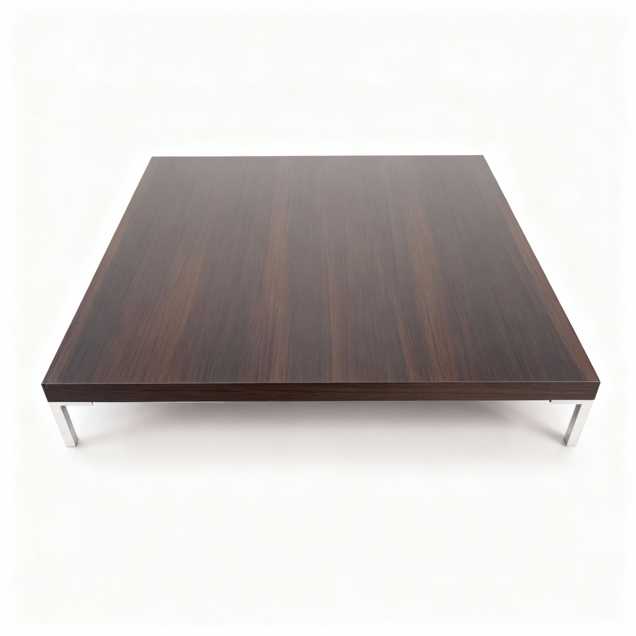 Large square coffee table (120x120cm) with a low, dark wenge finish top and short, discreet brushed aluminum legs, ideal for modern spacious living rooms