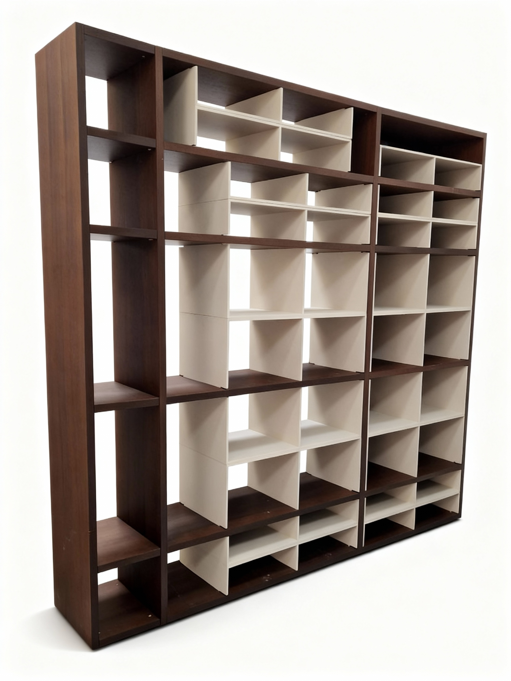 Contemporary 3-block modular bookcase featuring a dark walnut frame and light vanilla lacquered interior niches. The unit is tall and wide, designed for flexible storage.