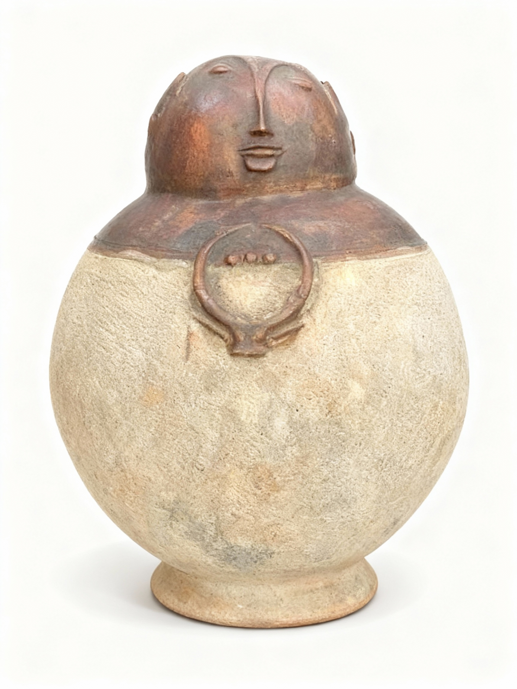 Sculptural terracotta vessel with primitive face lid that opens for secret storage, featuring a raw, textured beige and rust brown patina