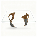 Rectangular glass coffee table on two sculptural bronze-gold bases