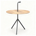 Set of three nesting tables with light wood tops and black metal legs