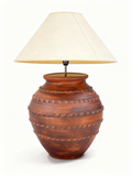 TERRA table lamp with patinated reddish-brown terracotta base with sculpted bands and beige shade