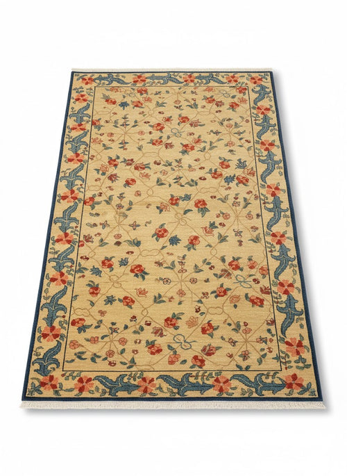 Chromatic Garden flat-weave rug 200x300cm with vivid yellow red and blue floral patterns