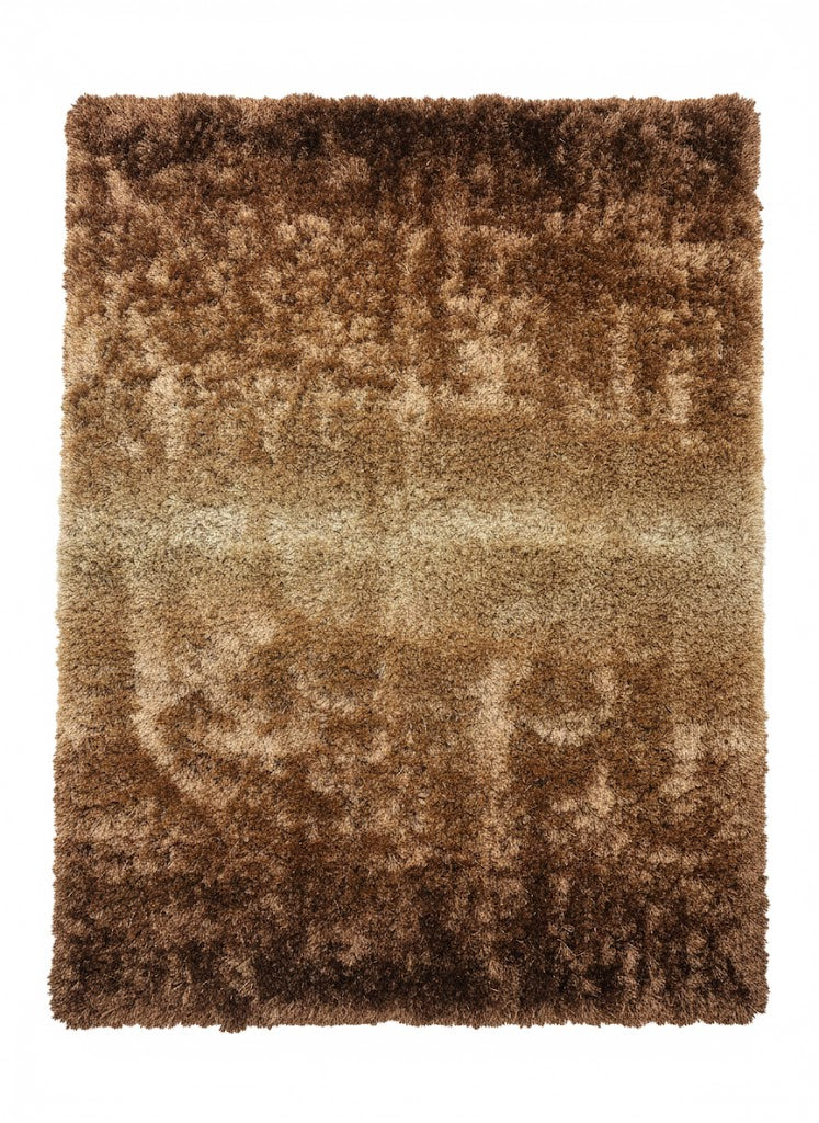 Tapis rectangulaire shaggy (poils longs) avec un dégradé de couleurs allant du brun foncé au doré/beige clair au centre. Texture très épaisse et moelleuse. Dimensions170x240 cm.