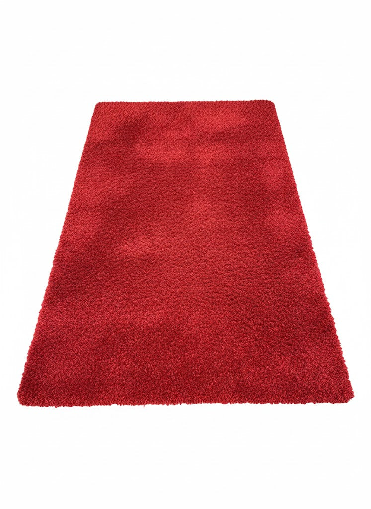 Tapis rectangulaire à poils courts de couleur rouge vif uni. Coupe dense, offrant un aspect velouté et élégant. Dimensions 170x240 cm.