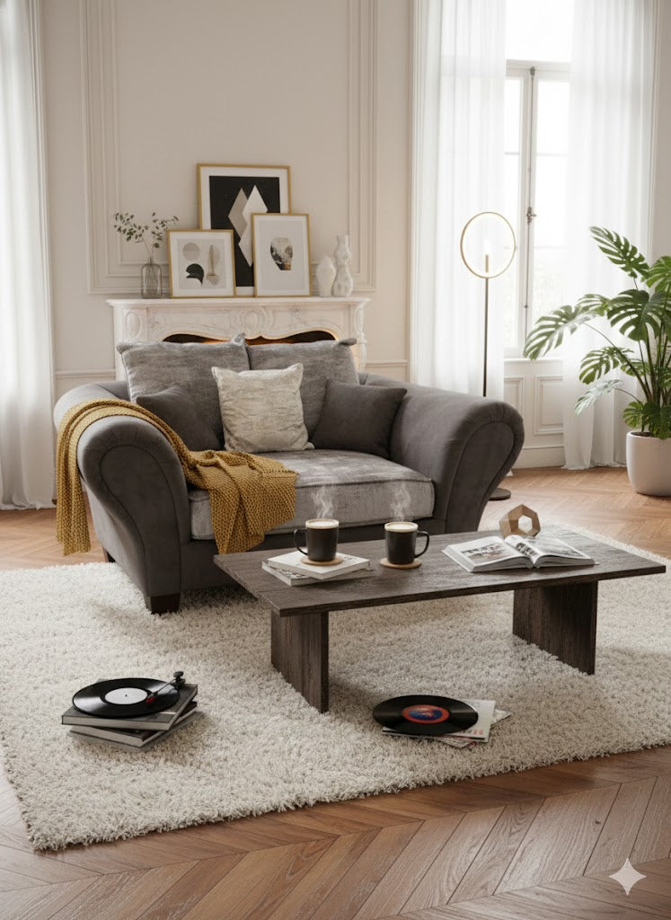 Wide, modern 1.5-seater armchair upholstered in soft brown velvet fabric, designed for two people to sit closely, perfect for snuggling