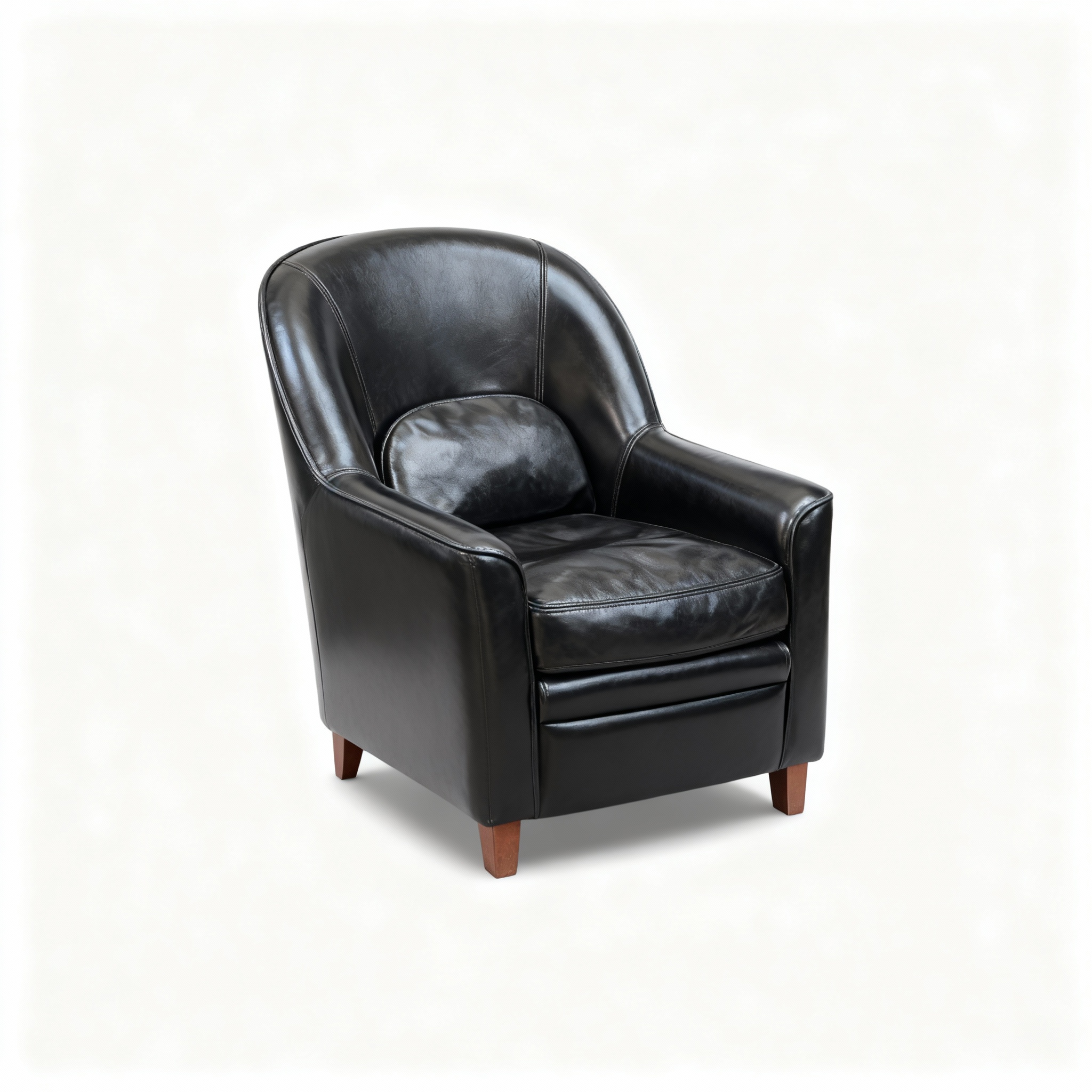 Classic "Timeless Luxury" club armchair upholstered in thick black full-grain leather, featuring a rounded, enveloping silhouette and fine black piping.