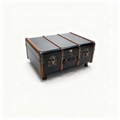 Vintage travel trunk coffee table with brass fittings and wooden straps